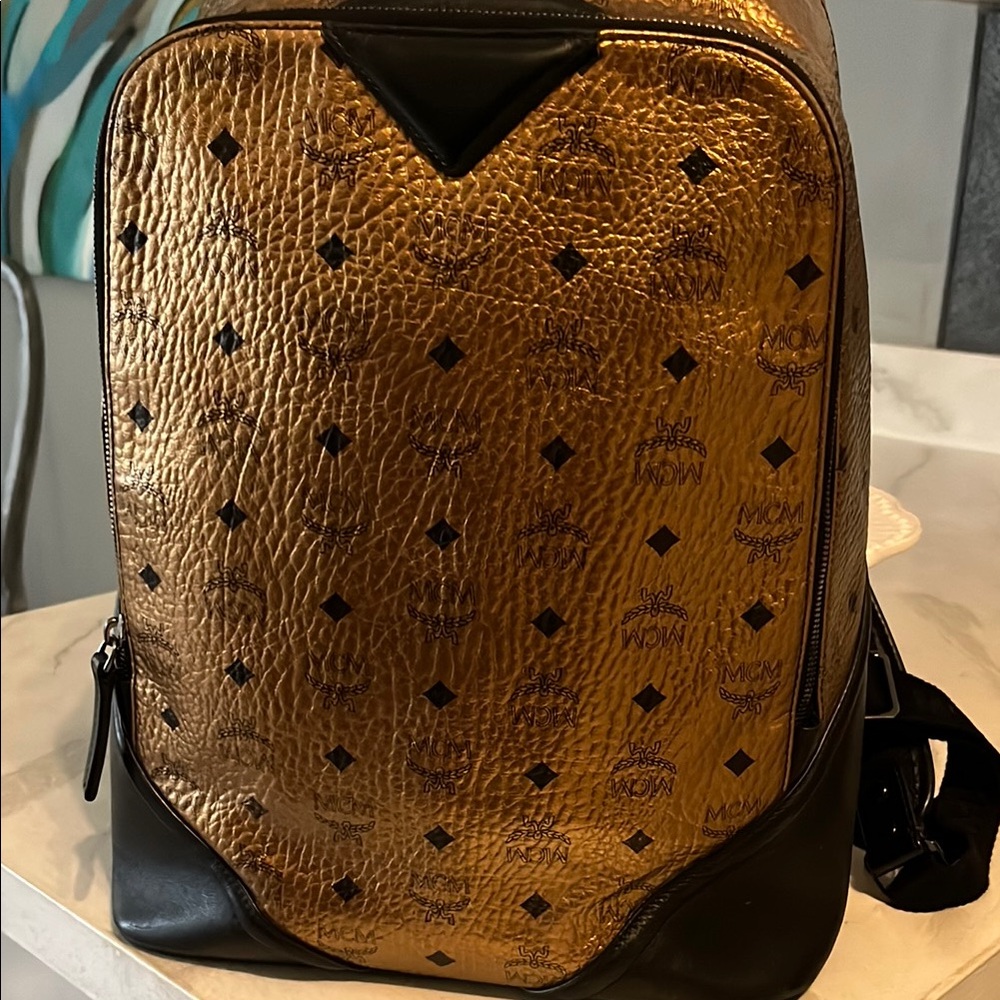 MCM Gold and Black Backpack